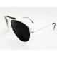 Foto chica del modelo 8920 - Visiontrainer: Lentes reticulares, estenopeicos, anteojos, ejercicios visuales.