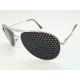 Foto chica del modelo 9126 - Visiontrainer: Lentes reticulares, estenopeicos, anteojos, ejercicios visuales.